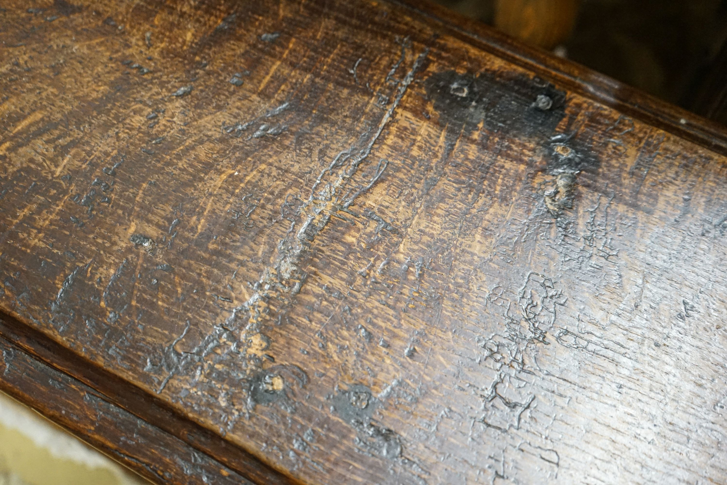 A 17th century style oak long stool, with solid seat on turned legs, length 119cm, depth 28cm, height 53cm